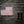 Patriotic Grey Barn with American Flag